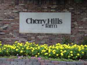 Entrance to Cherry Hills Farm in Cherry Hills Village Sign for Cherry Hills Farm